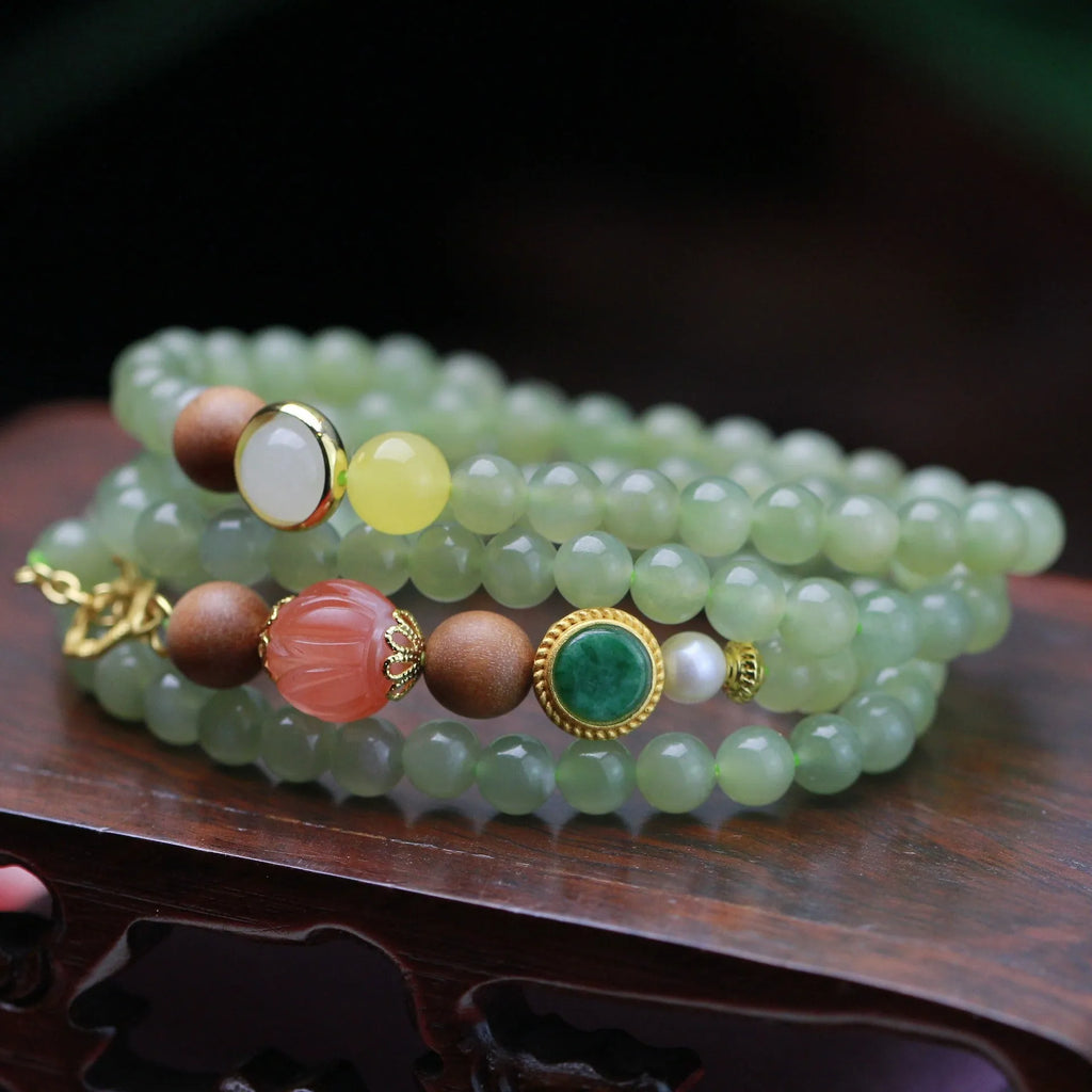 Natural Hetian jade necklace with red lotus, white sandalwood, and beeswax beads, unisex style with fu character motif