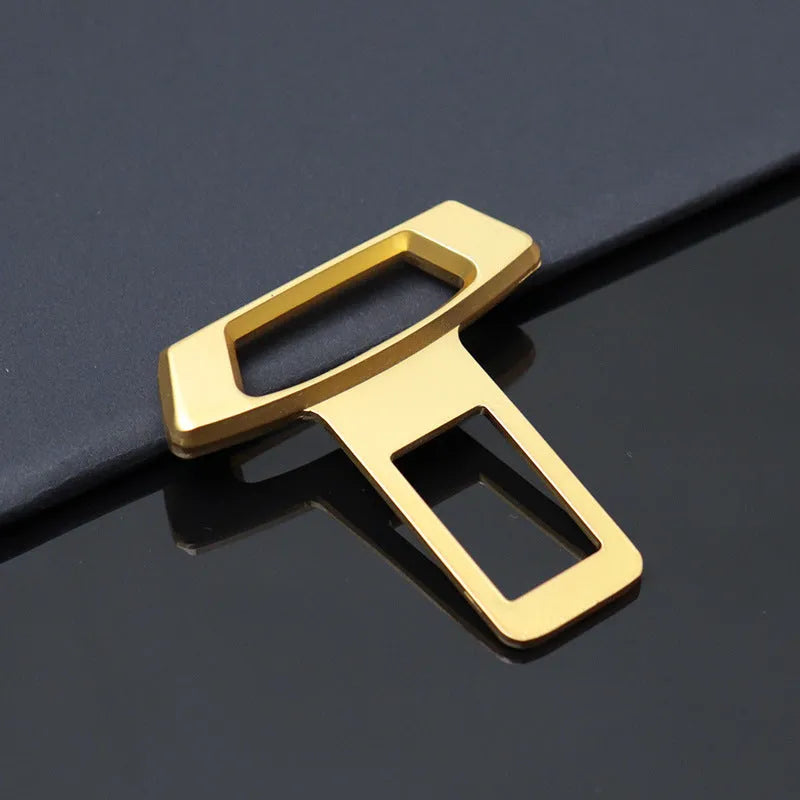 Metal car dashboard silencer insert shown in matte black, gold and silver colour options.
