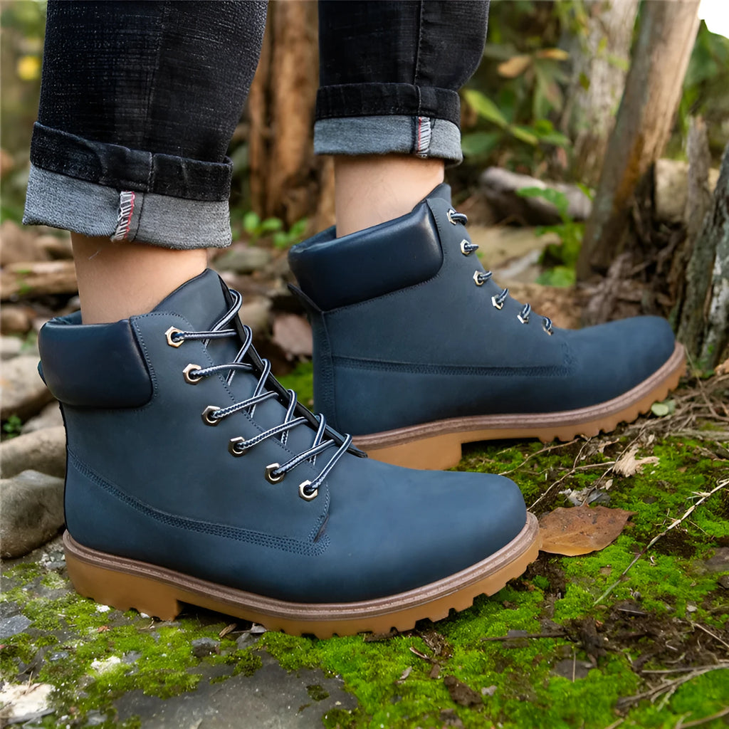 Pink men's high-top Martin boots with front laces and a velvet lining.