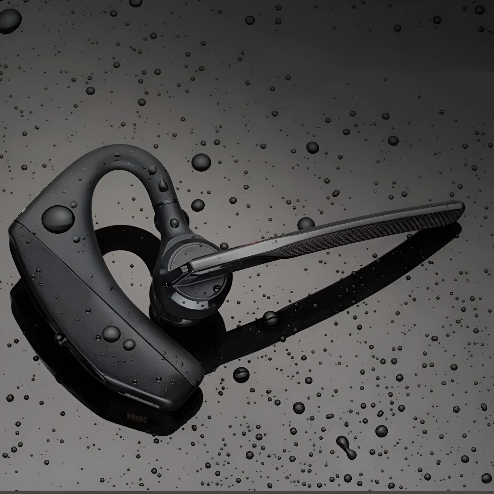 Black Bluetooth sports headphones with battery display screen and USB charging port