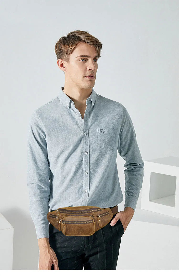 Brown retro leather messenger bag with a single shoulder strap shown open.