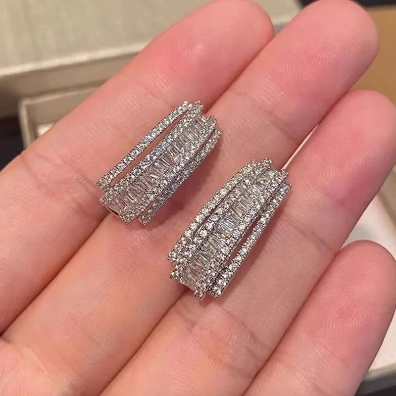 Women's white gold colour geometric stud earrings with zircon stones on copper base