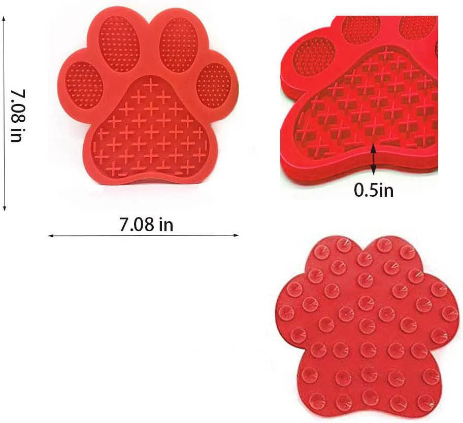 Blue bone-shaped silicone dog licking mat with suction cups on a shower tile.