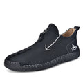 Men's brown leather-look martin boots with a front zipper and round toe on a rubber sole.