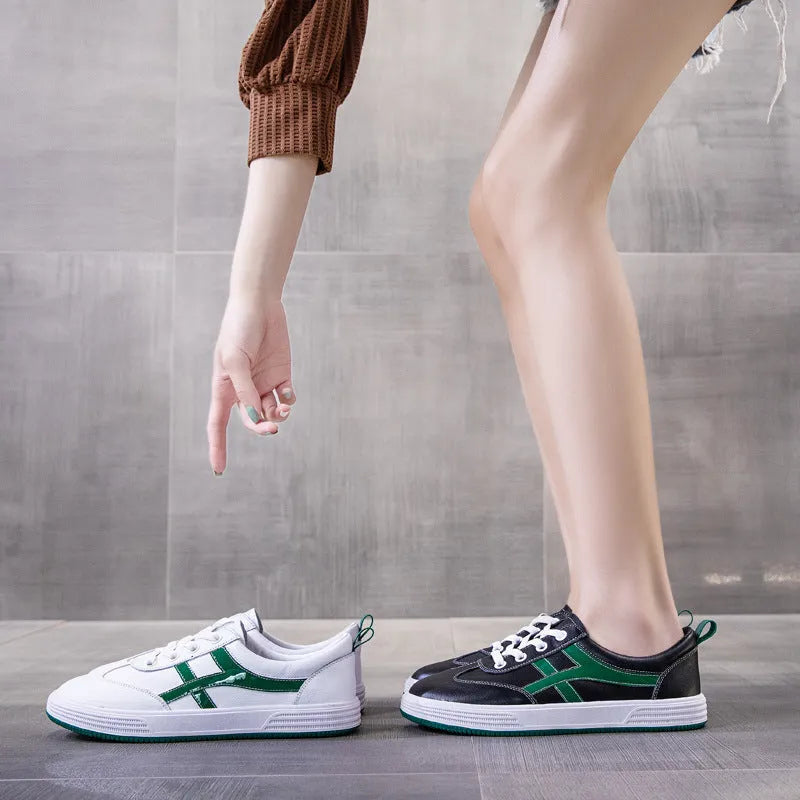 White and black casual Korean style low-top sneakers with sequin detailing, first layer cowhide upper, elastic band closure, and rubber sole