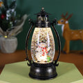 Crystal ball portable oil lamp Christmas ornament with plastic construction and paper-detailed seasonal figure