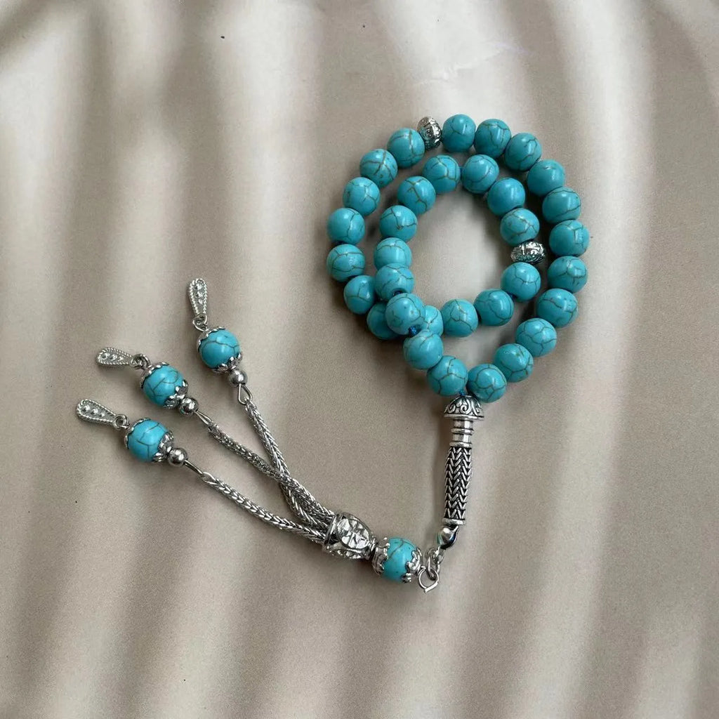 Handmade sky blue stone Muslim prayer bracelet with 8mm beads on a string.