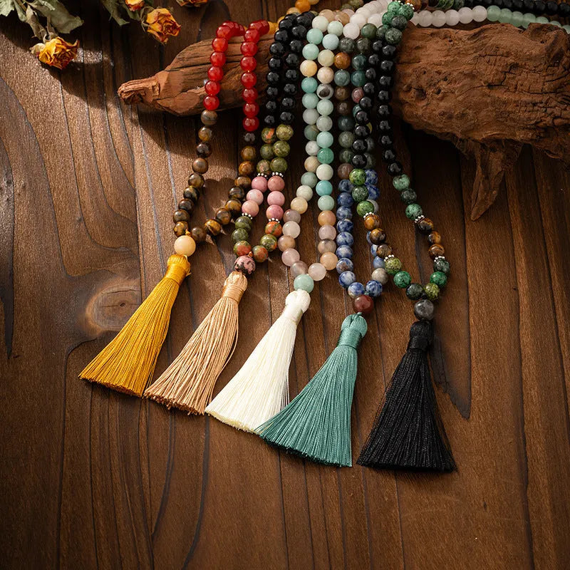 Natural stone beaded chain necklace with vintage tassel pendant and coordinating bracelet in bohemian retro style