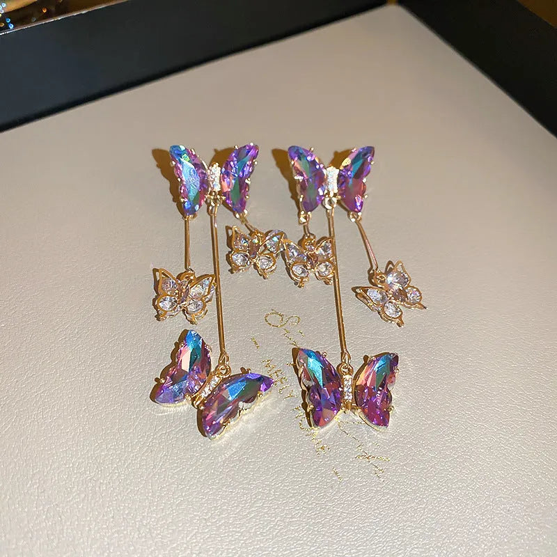 Blue purple butterfly tassel drop earrings with silver needle crystal flowers for women.