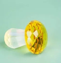 Colourful crystal mushroom decorative ornaments in geometric style on white background