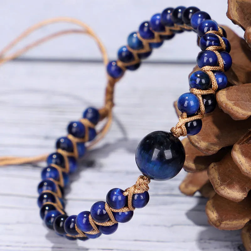 Hand-woven Tigereye gemstone pull bracelet showing geometric pattern and natural stone texture