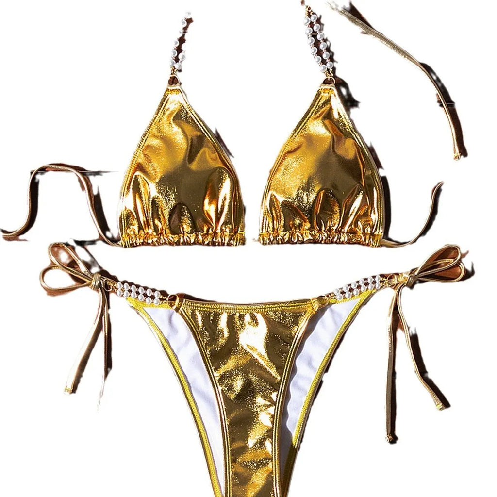 Gold halter lace-up bikini set with pearl chain detail for beach and pool wear