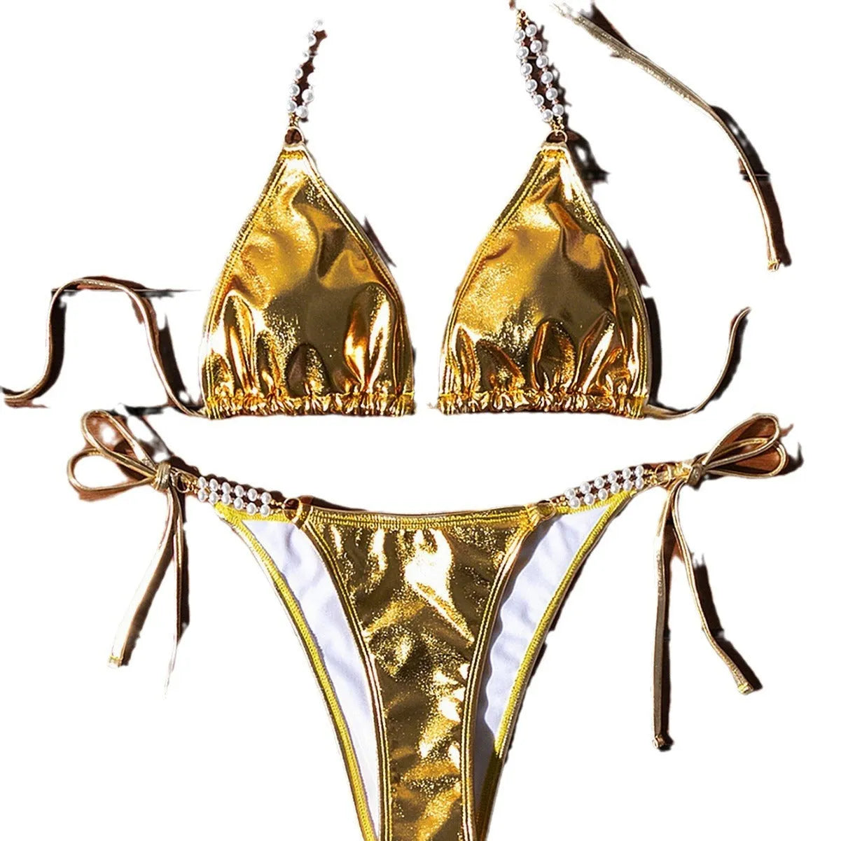Gold halter lace-up bikini set with pearl chain detail for beach and pool wear