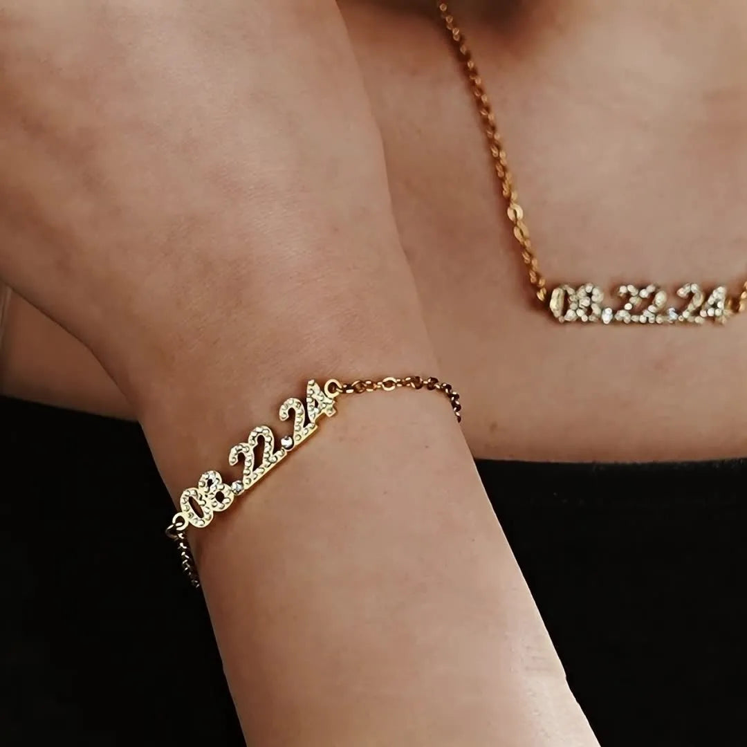 Stainless steel digital bracelet with diamond-studded numbers on display.