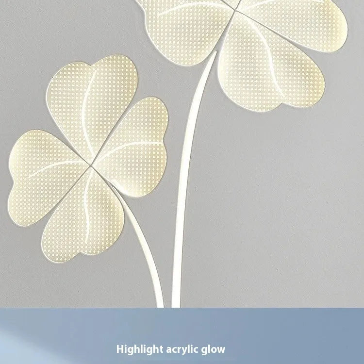 Modern wall lamp with decorative acrylic shade showing love heart design in pink colour option