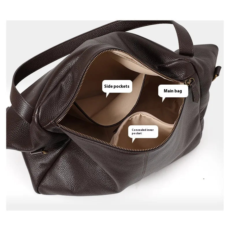 Brown genuine leather women's shoulder bag with horizontal square design showing interior zippered compartment