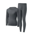 Men's constant temperature heating nylon bottoming suit in black with top and trousers on model