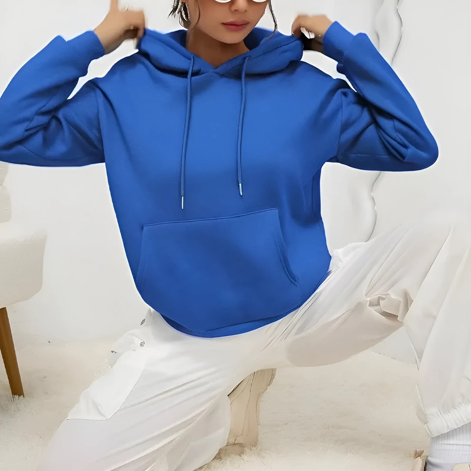 Loose long sleeve women sweatshirt with drawstring hem and front pocket in various colours like khaki and orange gray
