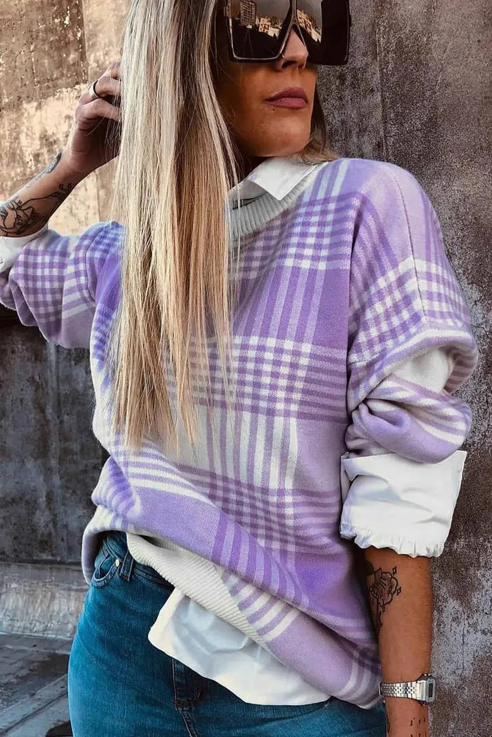 Lilac plaid print loose fit sweater with long sleeves and ribbed trim.