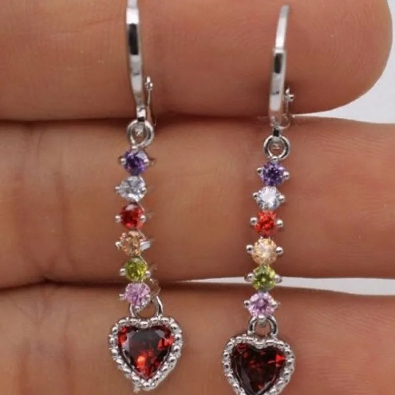 Pair of women's heart-shaped alloy earrings with electroplated gold or silver finish