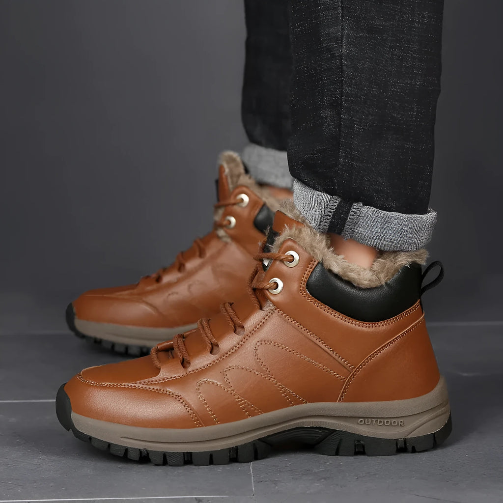 Men's black winter boots with plush lining, lace-up design, thick rubber sole, and round toe