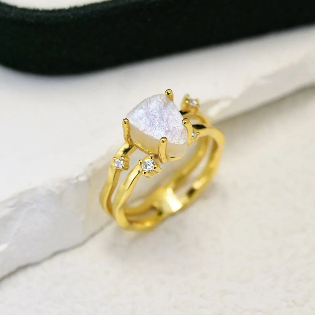 S925 silver ring with irregular triangle shape and moonstone in rose, white, or yellow gold finish.