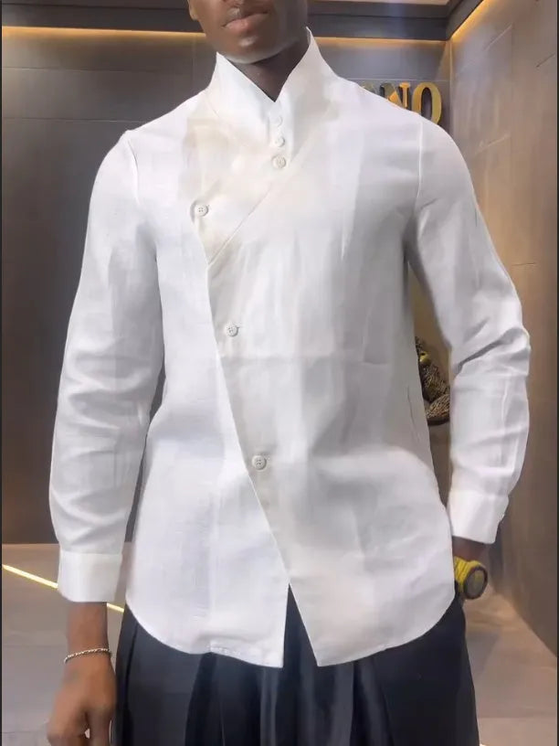 White asymmetric long sleeve shirt with black pleated pants set on a model for casual wear