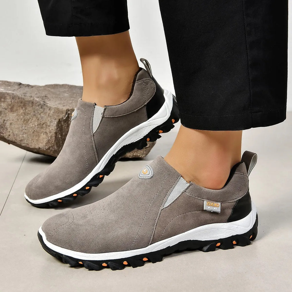 Men's round head thin shoes in five colours showing slip-on design for oversleeve applications