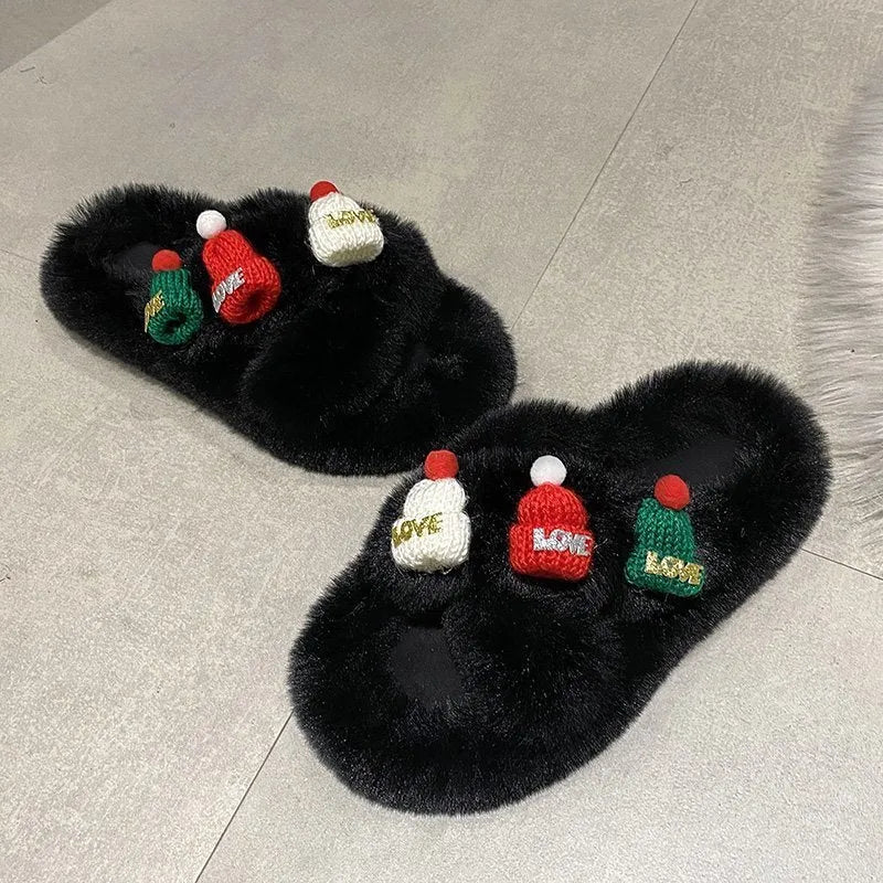 Women's faux plush slippers with a Christmas hat decoration, shown in a choice of colours.