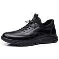 Men's black casual leather loafers with round toe, square heel, and slip-on design on a neutral background