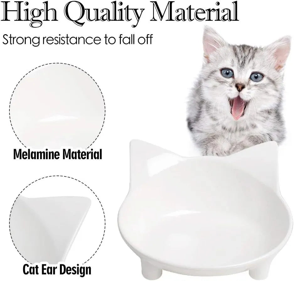 White shallow melamine cat bowl with non-slip rubber base on a wooden floor.