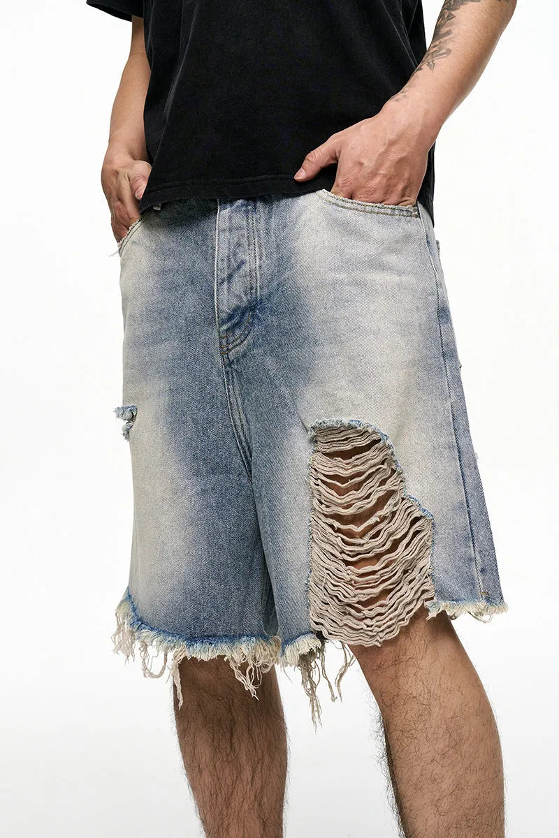 Men's light blue retro washed baggy denim shorts with wide leg cut and zipper fly