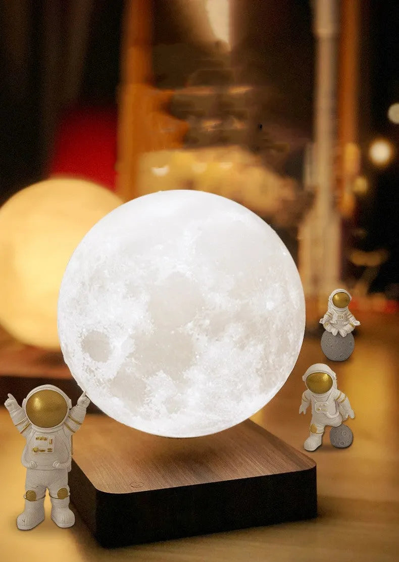 Maglev floating Moon night light with astronaut figures and USB power connection