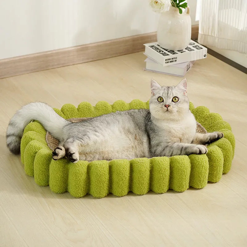 Green oval cat scratch pad bowl made of sisal, serving as a cat scratcher and bed lounge