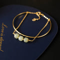 Jade lucky beads bracelet for women with gold inlay, shown in single, double, and three bead versions.