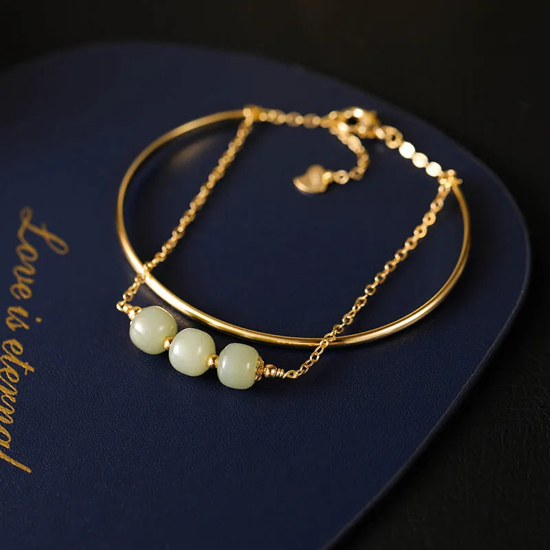 Jade lucky beads bracelet for women with gold inlay, shown in single, double, and three bead versions.