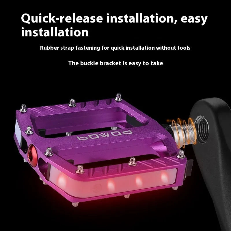 Pair of aluminium alloy bicycle pedals with integrated 710LED lights in black finish
