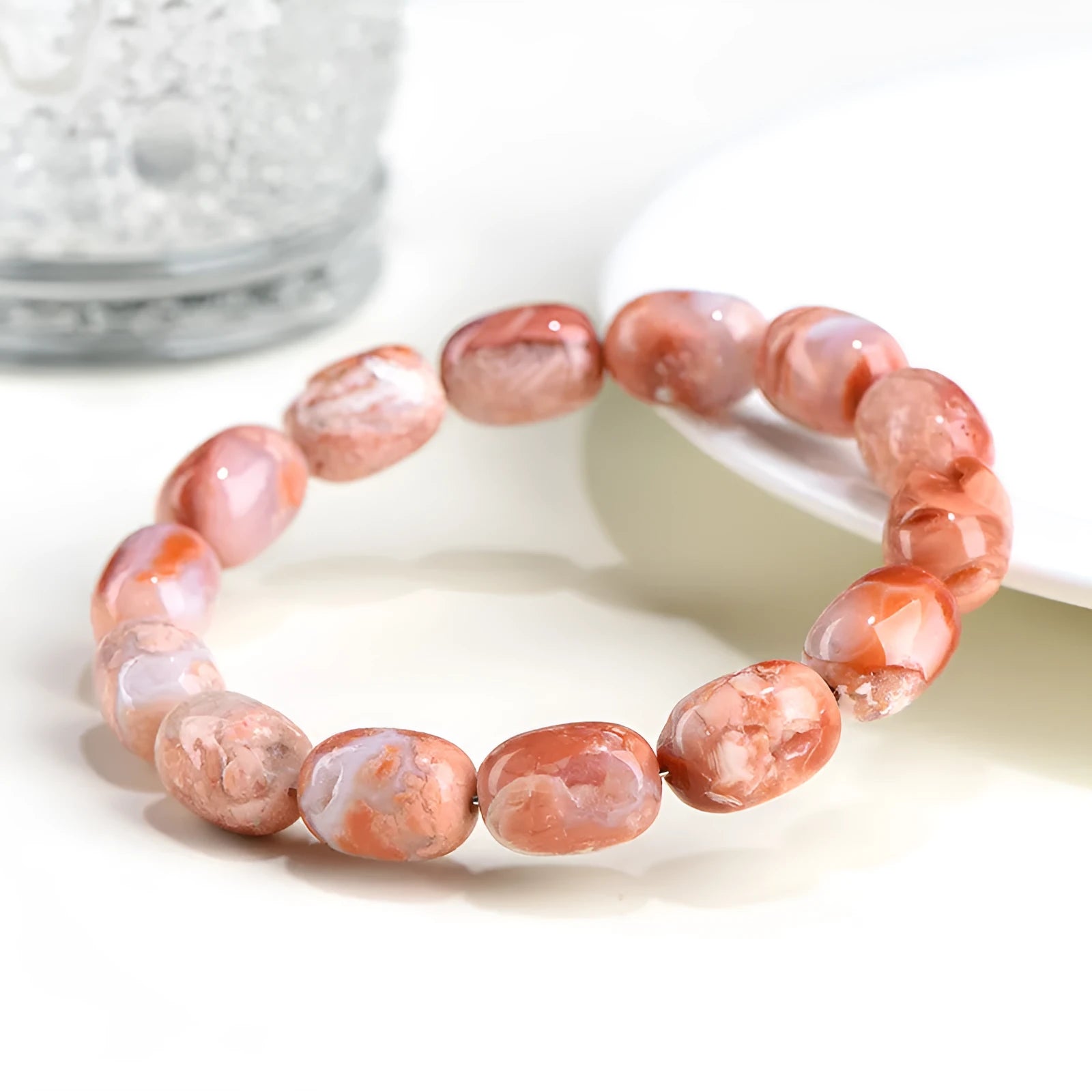 Natural cherry blossom agate bracelet with 10x14mm barrel beads and Ruyi geometric design elements