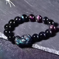 Natural ice colour eye obsidian crystal bracelet with round beads on wrist