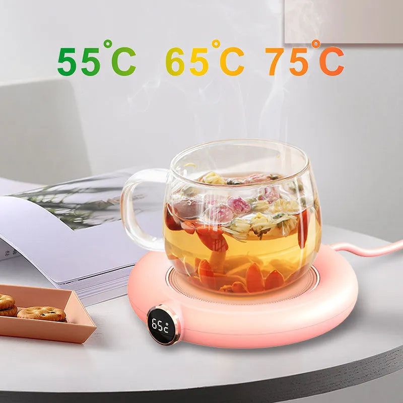 USB cup warmer pad with LED display showing temperature setting, on a desk with a mug of coffee