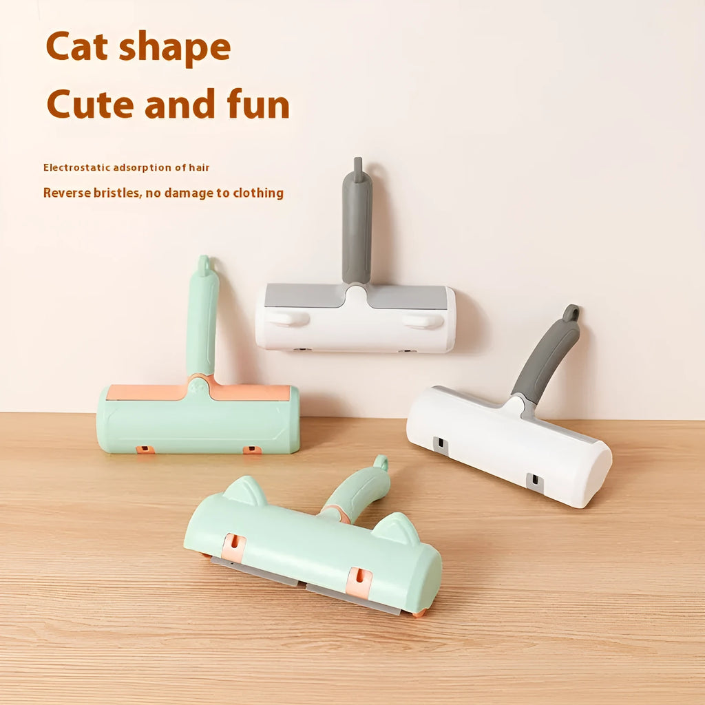 Mint green cat hair removal brush with ear style design on a light background