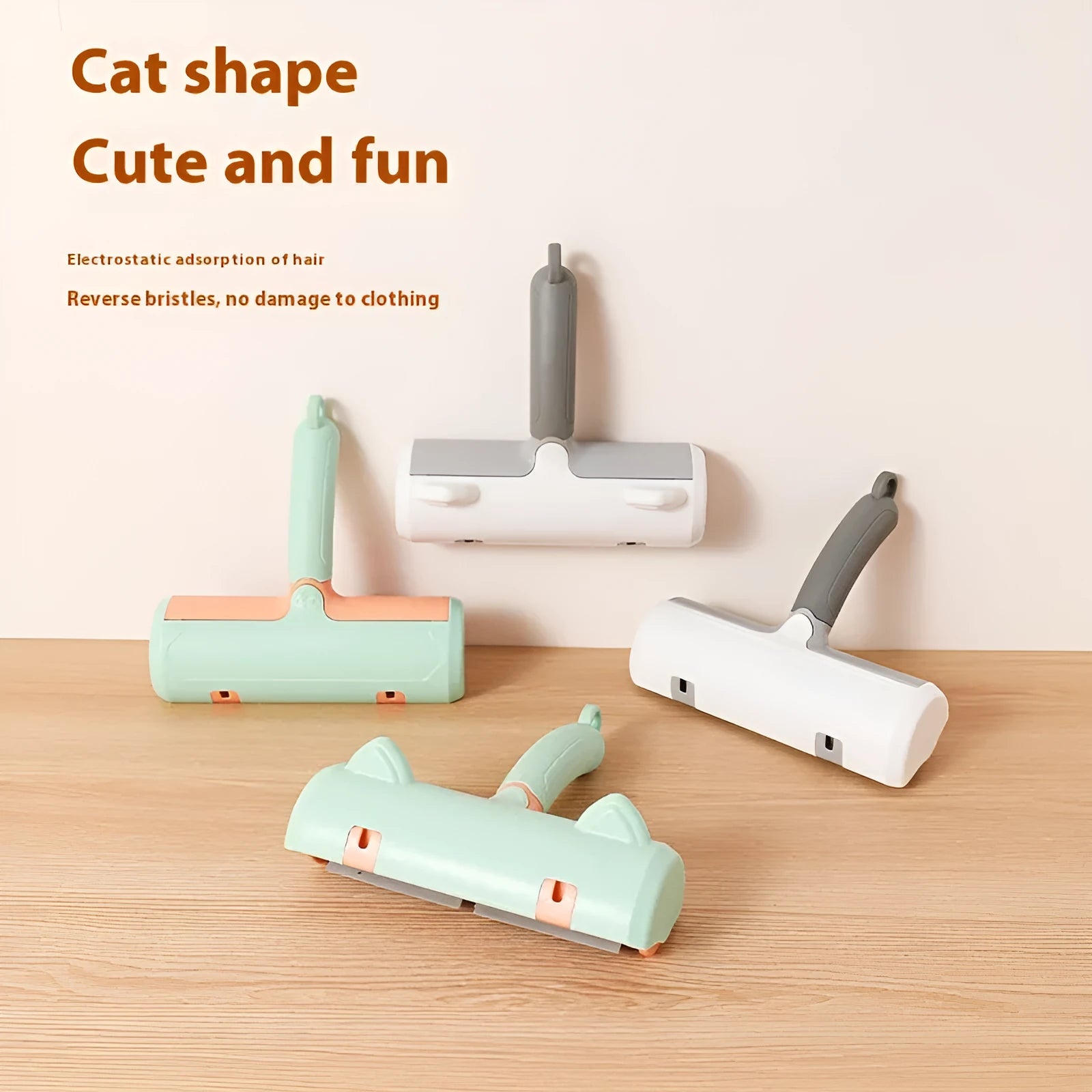 Mint green cat hair removal brush with ear style design on a light background