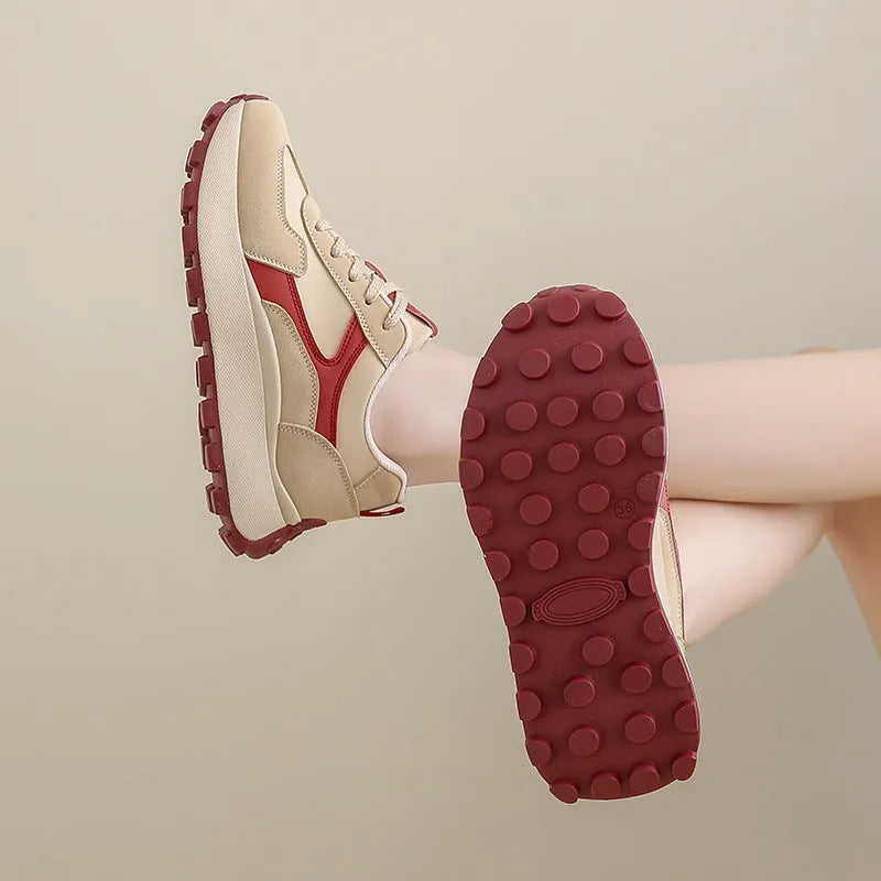 Women's low-top lace-up platform sneakers in three colours with a rubber sole and mesh lining.
