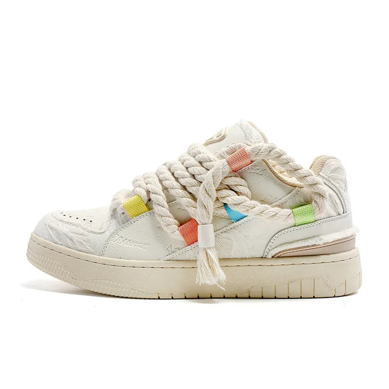 Creamy white retro skateboard trainers with old damage lace and round toe on rubber sole