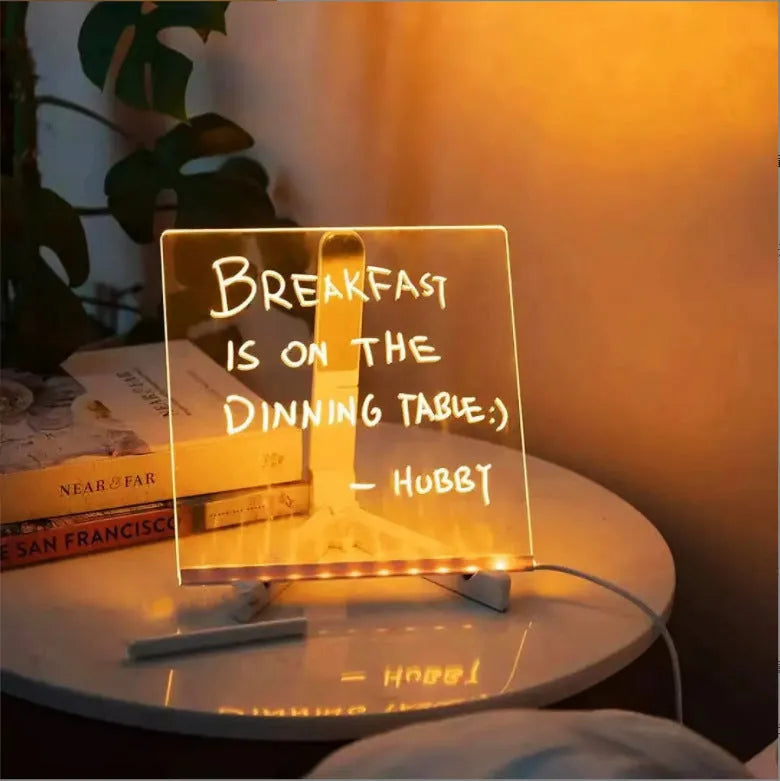 Acrylic DIY note board LED night light showing a transparent board with written messages, USB power, and bracket setup