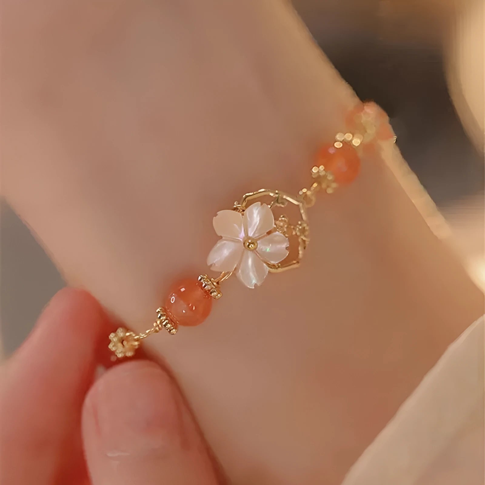 Redgusset alloy bracelet with five-pointed star charm on wrist