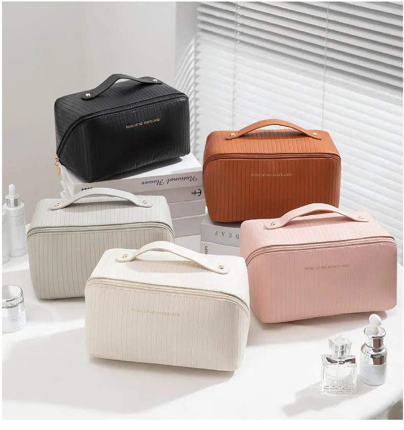 Vertical pattern cubic pillow makeup bag with 22.5 cm dimensions and PU construction
