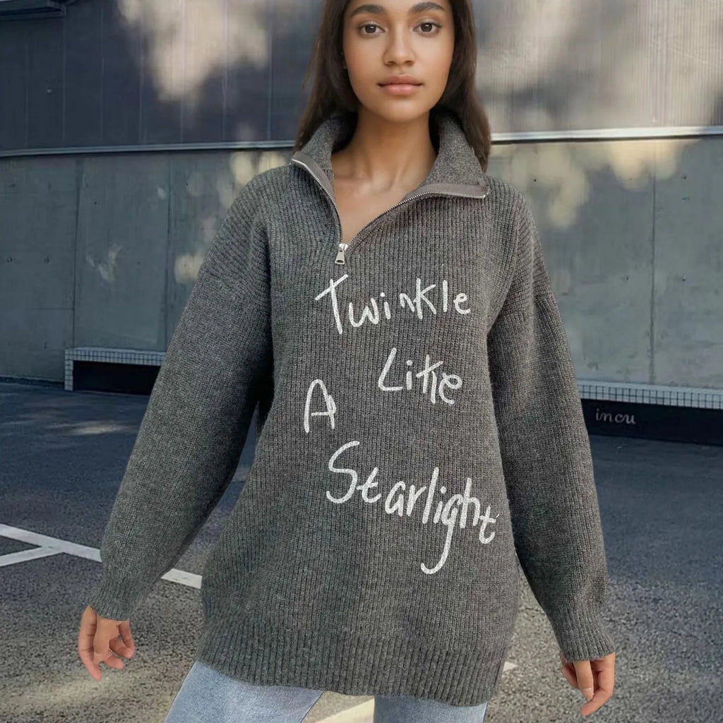 Light khaki women's alpaca wool pullover sweater with a diagonal front zipper and turtleneck.