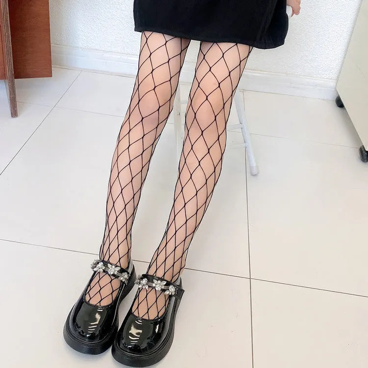 Women's black and white mesh stockings showing large, medium, and small net patterns on a leg.