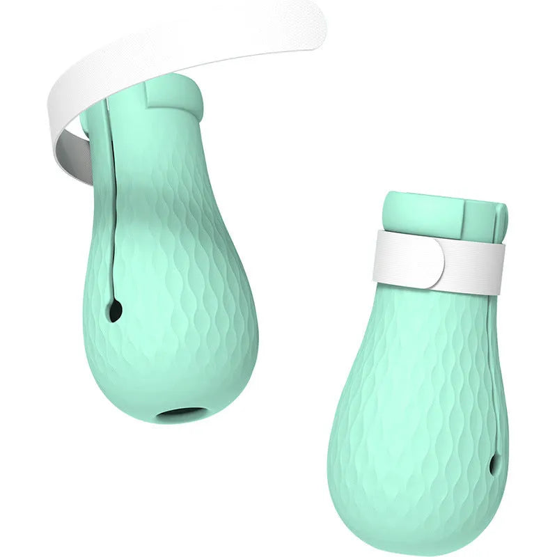 Four green silicone cat paw covers designed to prevent scratching and assist with pet handling